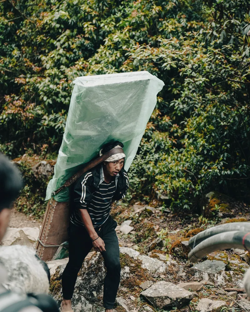 porter on the trail - panch pokhari